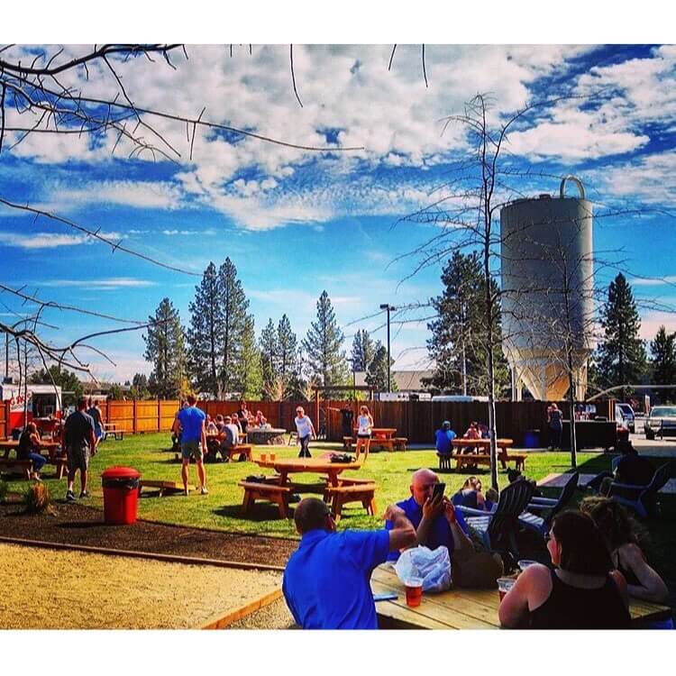 We are loving these warm summer nights in the #biergarten! It's open everyday so come by and have some beer and play some lawn games! 📷: @tytybend