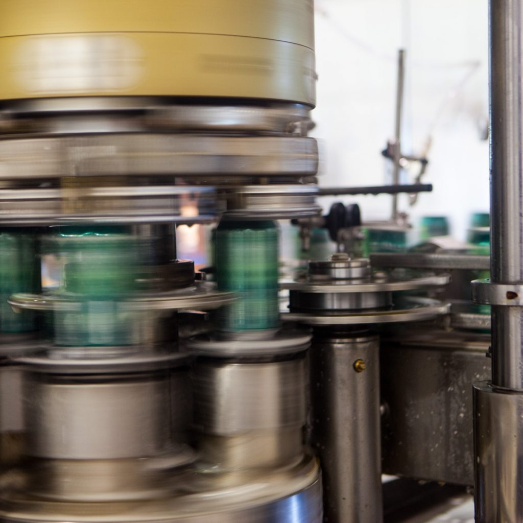 Beer cans in canning process