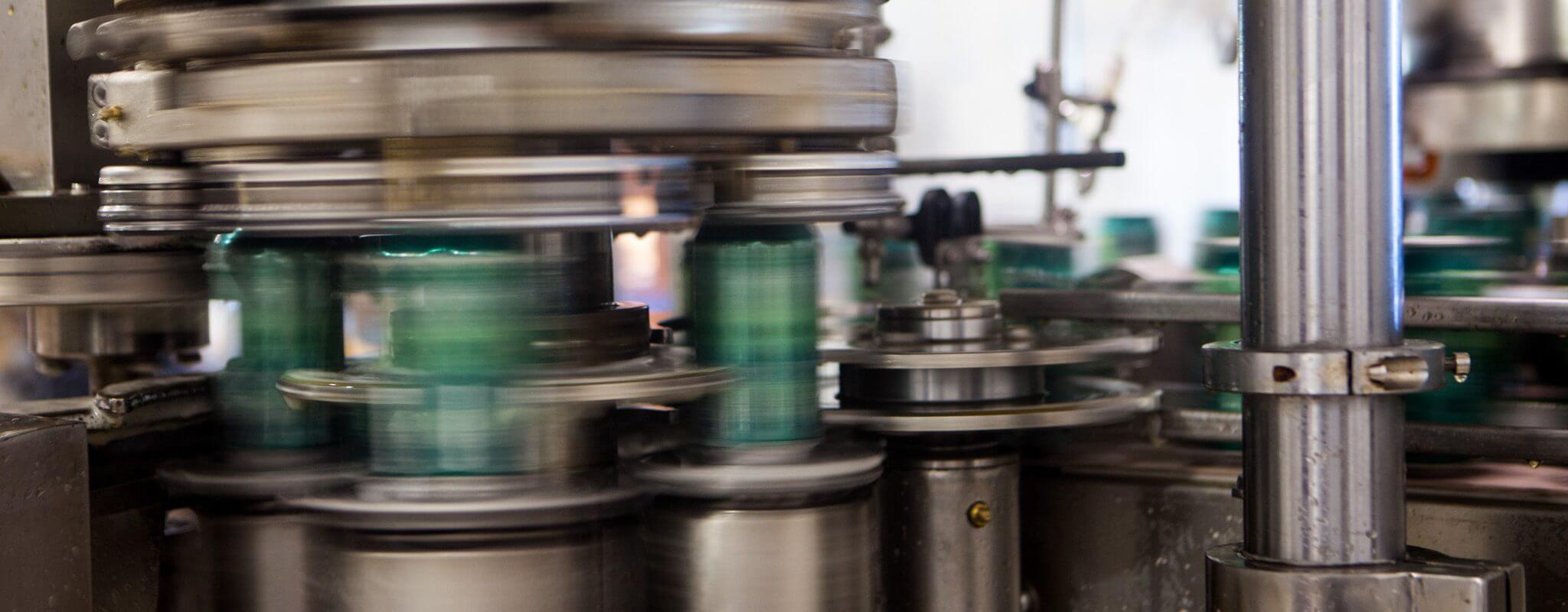 Beer cans in canning process